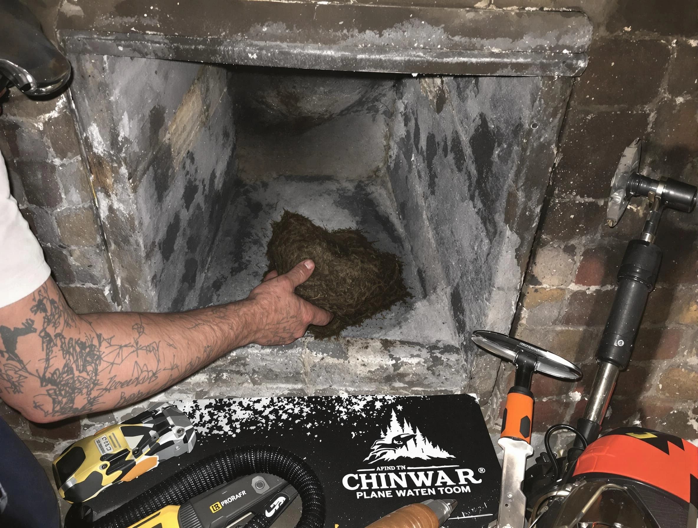 North Strabane Chimney Sweep safely removing debris and screening chimney in North Strabane, PA